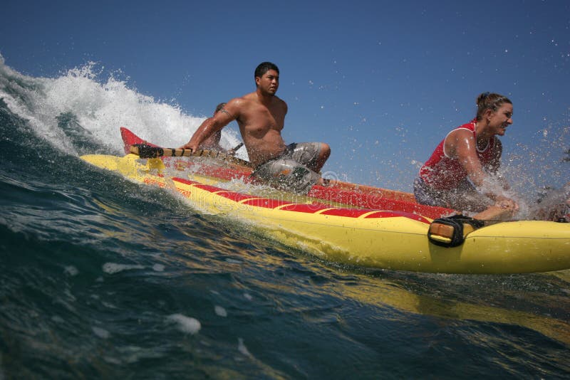 Canoe surfing at Makaha editorial photography. Image of northshore