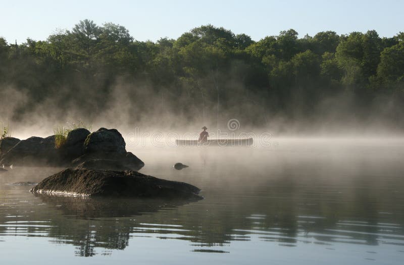 Canoeist on a Misty Lake, Haliburton