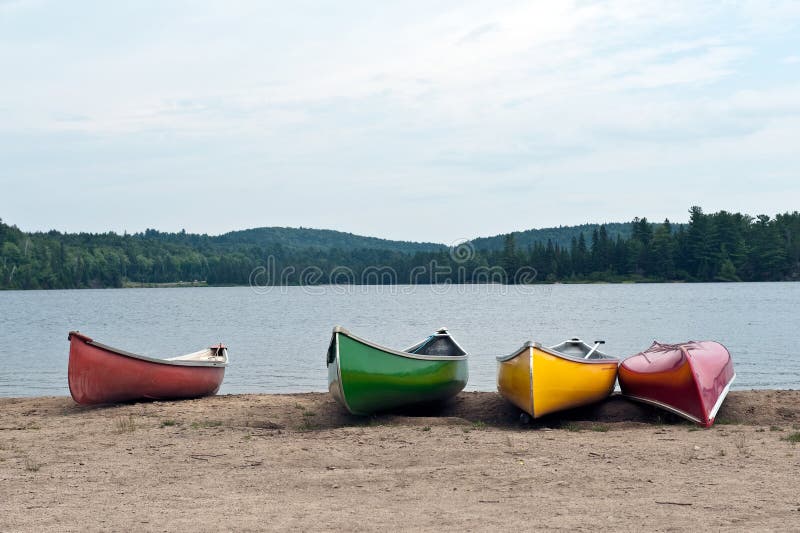 Canoes on the lake stock image. Image of area, canoeing 15332059