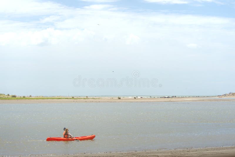 Canoista marino del paesaggio fotografia stock Canoista marino del paesaggio fotografia stock