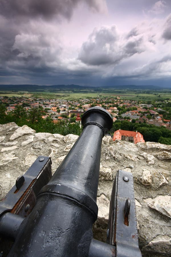 Canon with dark clouds