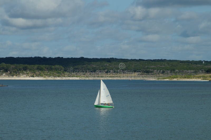 Here is a of Lake Georgetown taken from one of the many public parks that surrounds it. A family is enjoying boating on the water. There is also fishing, and many other water activities that go on here daily. Here is a of Lake Georgetown taken from one of the many public parks that surrounds it. A family is enjoying boating on the water. There is also fishing, and many other water activities that go on here daily.