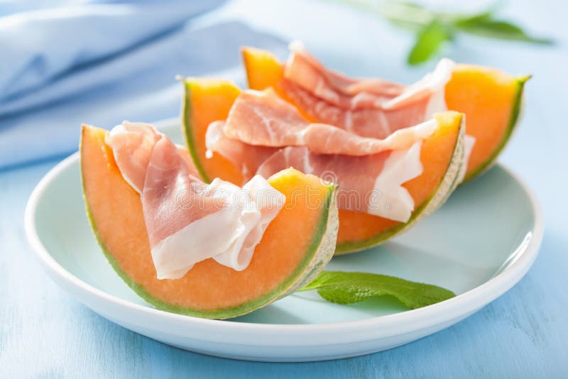 Cantaloupe melon with prosciutto. italian appetizer royalty free stock photo Cantaloupe melon with prosciutto. italian appetizer royalty free stock photo