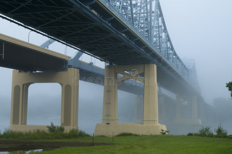 Cantilever Bridge in Fog Over Mississippi River royalty free stock photography