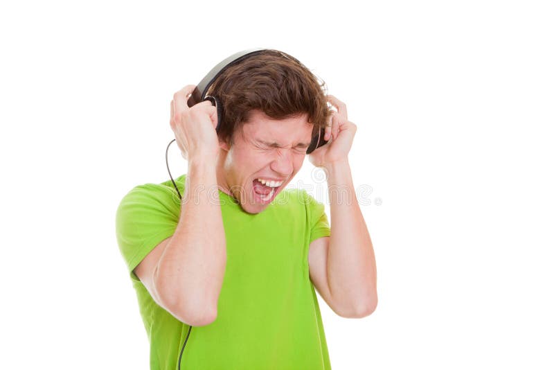 Adolescente a cantar com auscultadores fotografia de stock royalty free