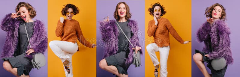 Canto de chica con atuendo de invierno de moda bailando con bolsa gris posando sobre fondo morado. retrato interior de imagen de archivo libre de regalías