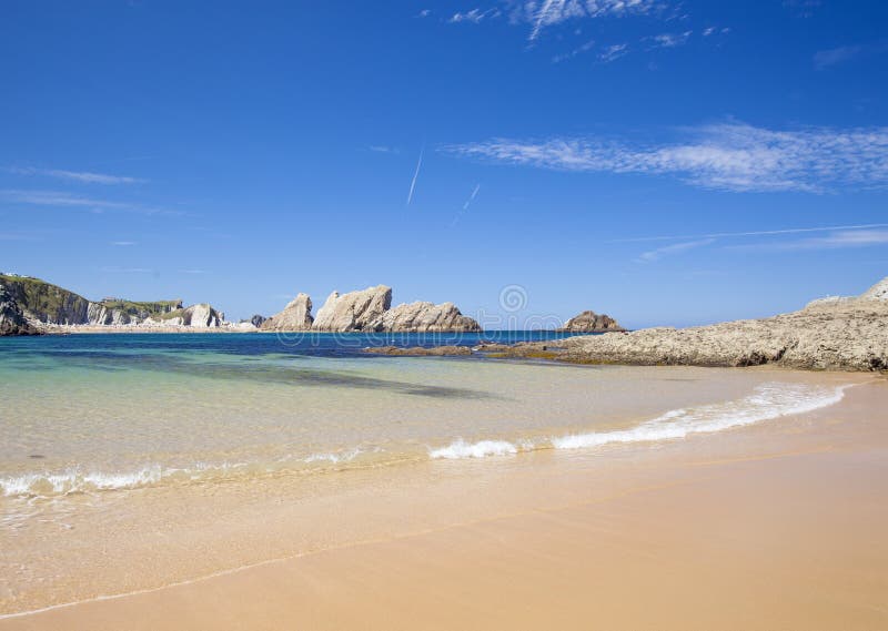 Cantabria, Costa Quebrada, spectacular beach Playa de Covachos, sandbank exposed by the low tide, view west. Cantabria, Costa Quebrada, spectacular beach Playa de Covachos, sandbank exposed by the low tide, view west