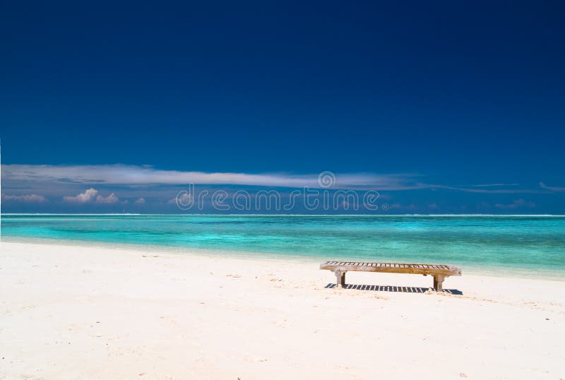 Canvas Chair on tropical beach stock photography