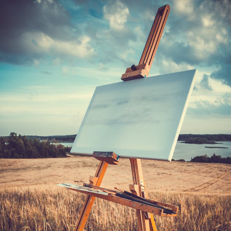 Canvas rests on a easel on lake landscape