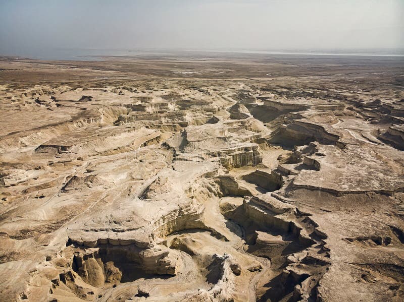 Canyon in the Judean Desert. Aerial view of the Judean desert located on the West Bank of the Jordan river. Deserted shore of dead