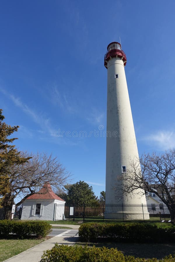 Cape May lighthouse stock photo. Image of blue, trees 97770546