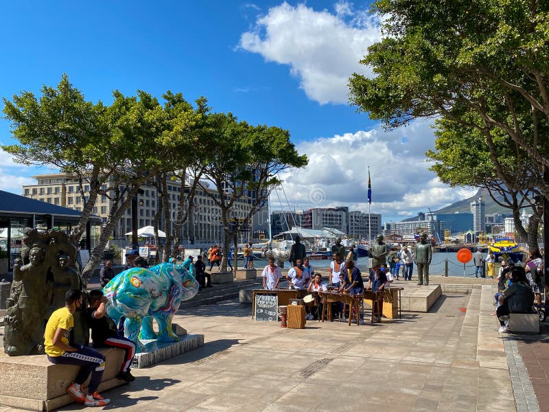 CAPE T, SOUTH AFRICA - Sep 27, 2020: Cape Town residents enjoying lockdown level 1 at the Nobel Square at the V&A Waterfront in C