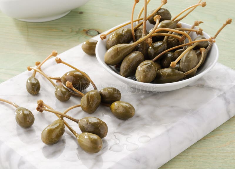 Capers in the bowl royalty free stock images
