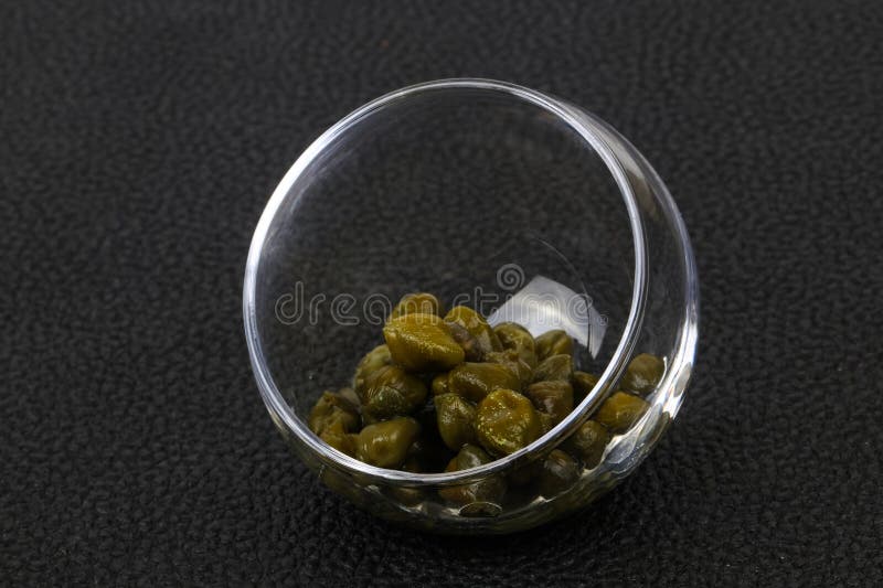 Capers in the bowl royalty free stock photo