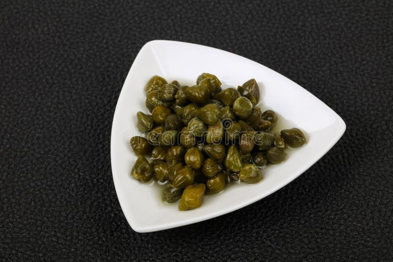 Capers in the bowl royalty free stock photo
