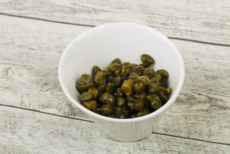 Capers in the bowl royalty free stock photography