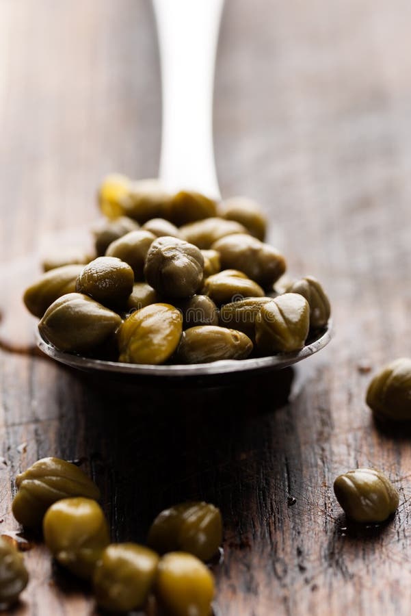 Capers in Spoon on Wooden Table Stock Photo Image of caper, vegetable