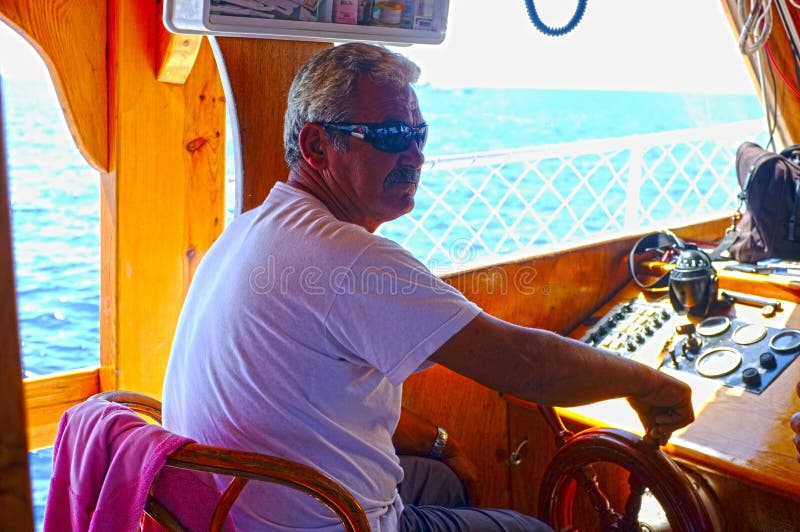 Capitano di piccola nave passeggeri immagini stock libere da diritti