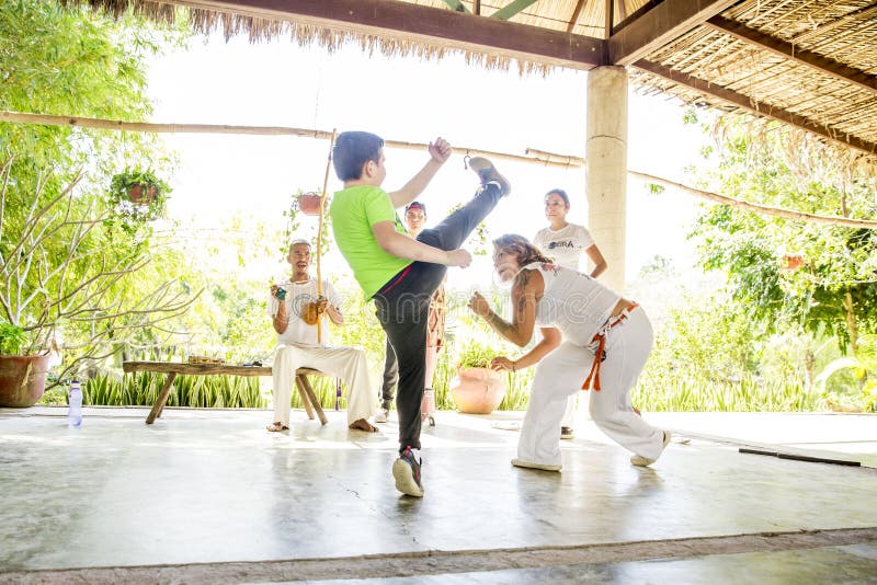 A local group teaches Capoeira, a Brazilian style of dance fighting, at Rancho Tierra Madre in Puerto Vallarta, Jalisco, Mexico. A local group teaches Capoeira, a Brazilian style of dance fighting, at Rancho Tierra Madre in Puerto Vallarta, Jalisco, Mexico