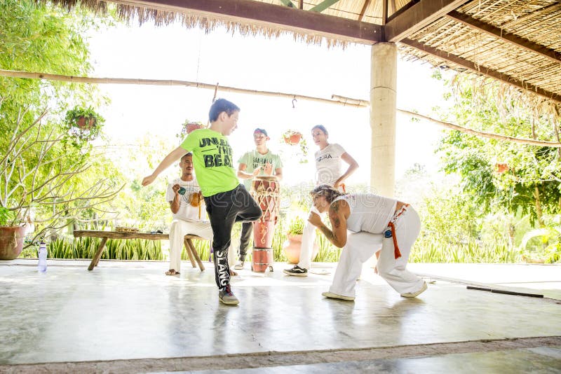 A local group teaches Capoeira, a Brazilian style of dance fighting, at Rancho Tierra Madre in Puerto Vallarta, Jalisco, Mexico. A local group teaches Capoeira, a Brazilian style of dance fighting, at Rancho Tierra Madre in Puerto Vallarta, Jalisco, Mexico