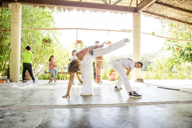 A local group teaches Capoeira, a Brazilian style of dance fighting, at Rancho Tierra Madre in Puerto Vallarta, Jalisco, Mexico. A local group teaches Capoeira, a Brazilian style of dance fighting, at Rancho Tierra Madre in Puerto Vallarta, Jalisco, Mexico