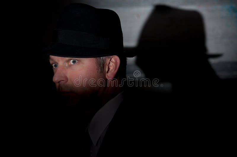 Cappello criminale noir dell'agente investigativo del film fotografie stock libere da diritti Cappello criminale noir dell'agente investigativo del film fotografie stock libere da diritti