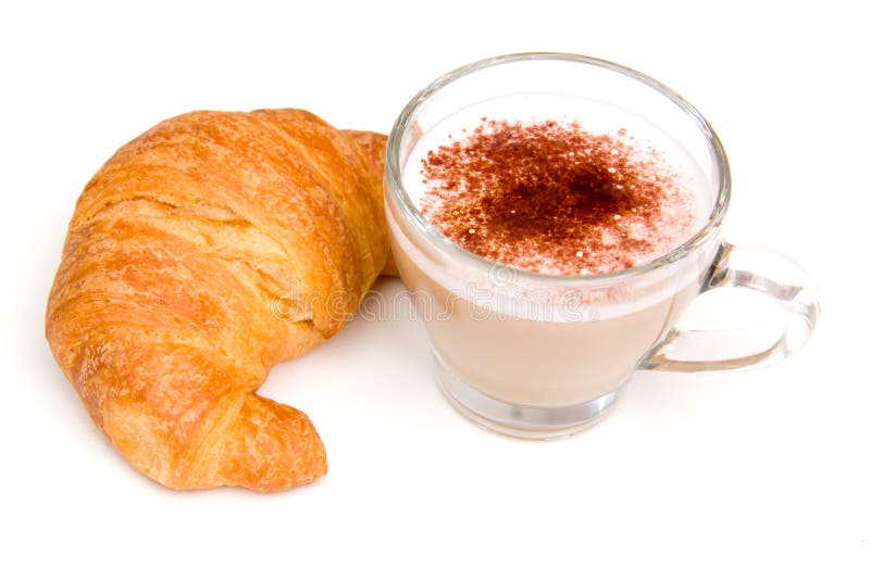Cappuccino e croissant fotografie stock Cappuccino e croissant fotografie stock
