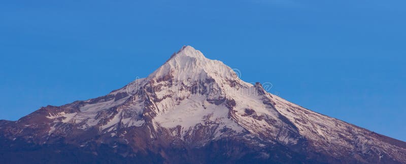 Mount Hood with a bright blue sky. Mount Hood with a bright blue sky.