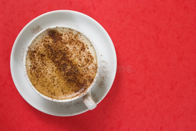 Cappuchno on red stock photos Cappuchno on red stock photos