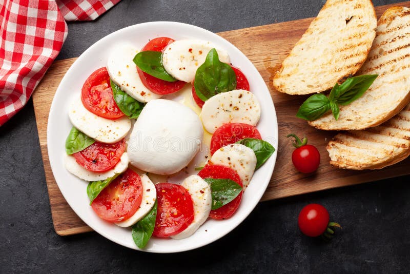 Caprese salad with mozzarella, basil and garden tomatoes