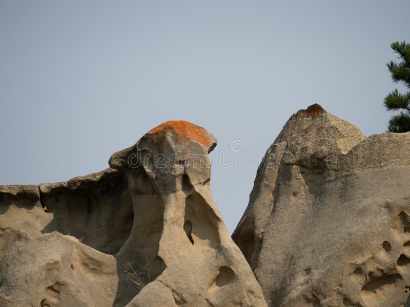 Capstone with Orange Lichen in Medicine Rocks State Park in Montana