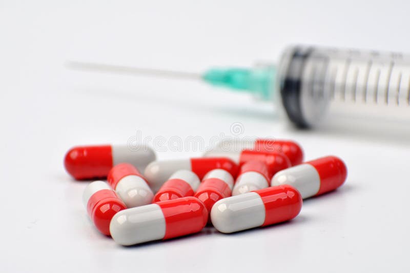 Capsule Pill Drug Medicine with Injection White Background