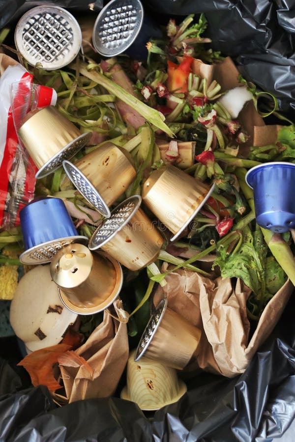 Capsules of Coffee Espresso in a Trash and Not Recycled. Stock Image