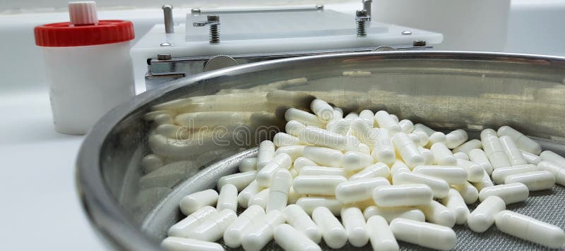 Capsules compounding stock photo. Image of background 132664956