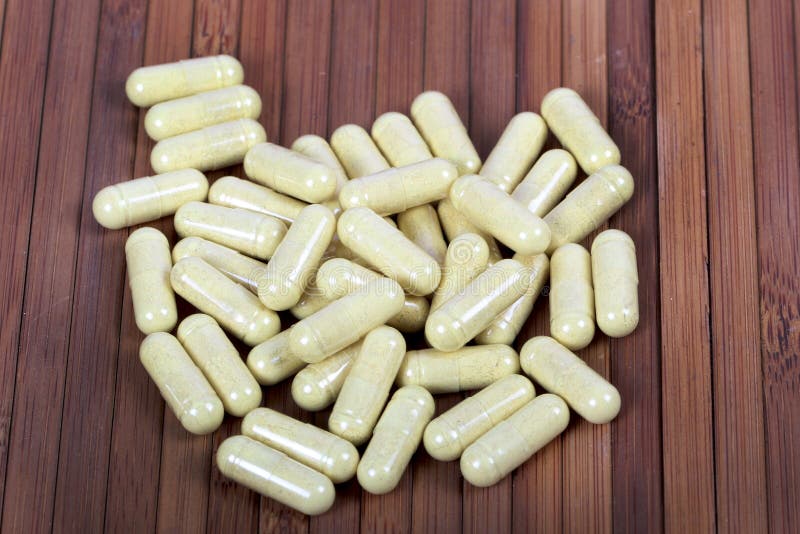 Capsules de fines herbes photographie stock Capsules de fines herbes photographie stock