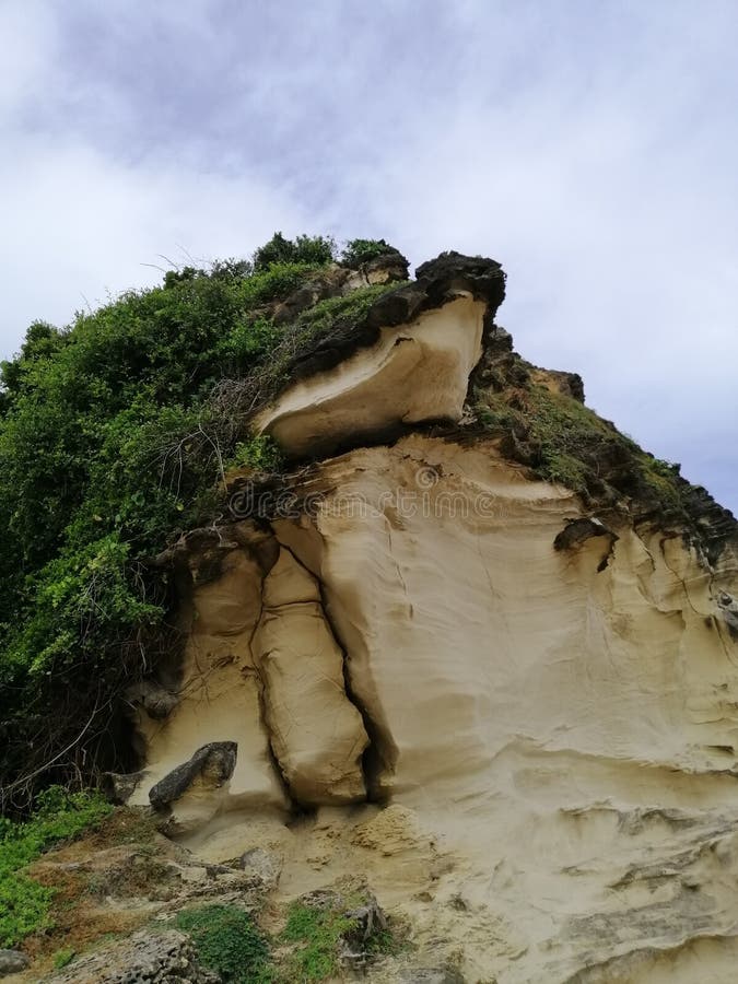 Capurpurawan Rock Formation in Ilocos Sur Stock Image - Image of rock ...