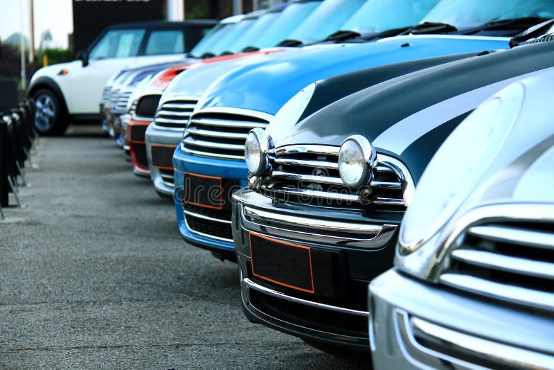 Cars lined up polished and clean. Cars lined up polished and clean