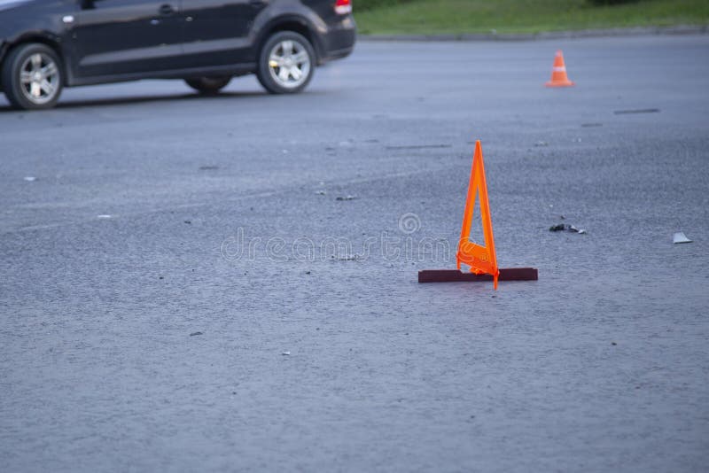 Car accident in the city. Emergency sign on the asphalt royalty free stock photography