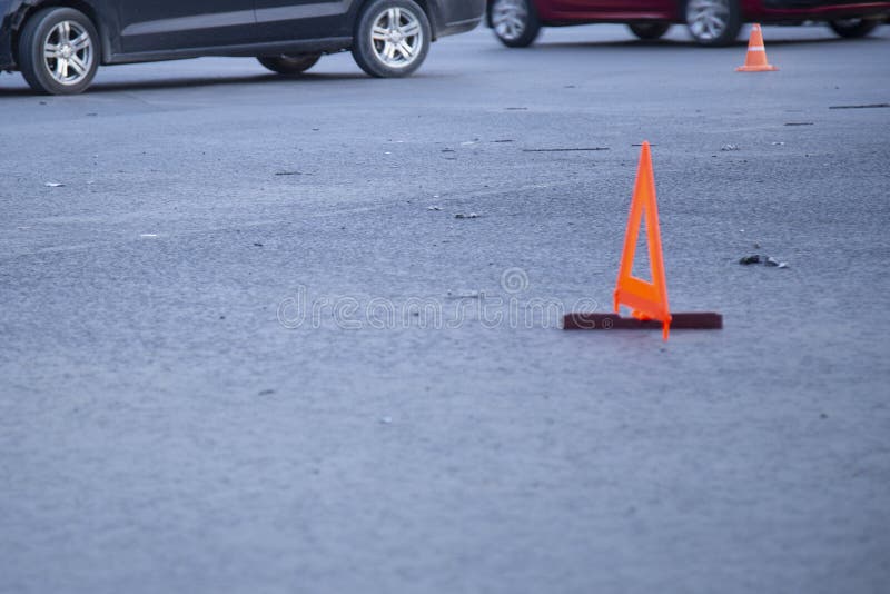 Car accident in the city. Emergency sign on the asphalt royalty free stock images