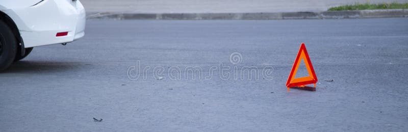 Car accident in the city. Emergency sign on the asphalt stock photography