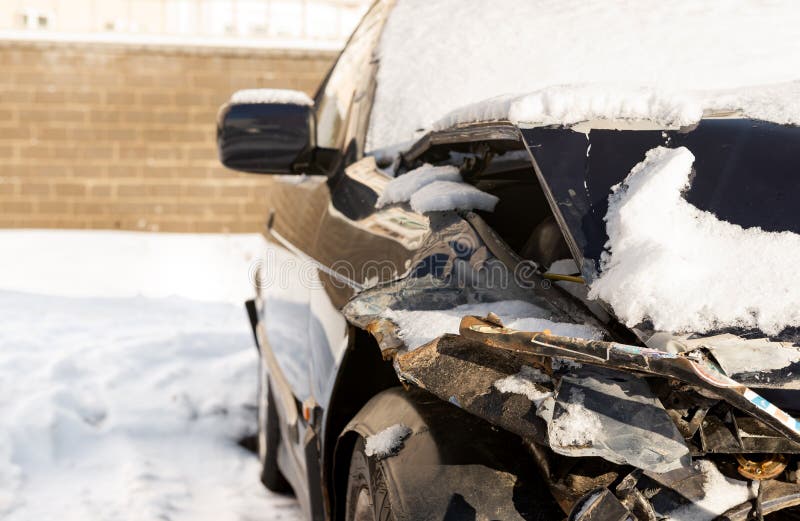 Car after an Accident. Transport. Wrecked Car with an Open Hood Stock