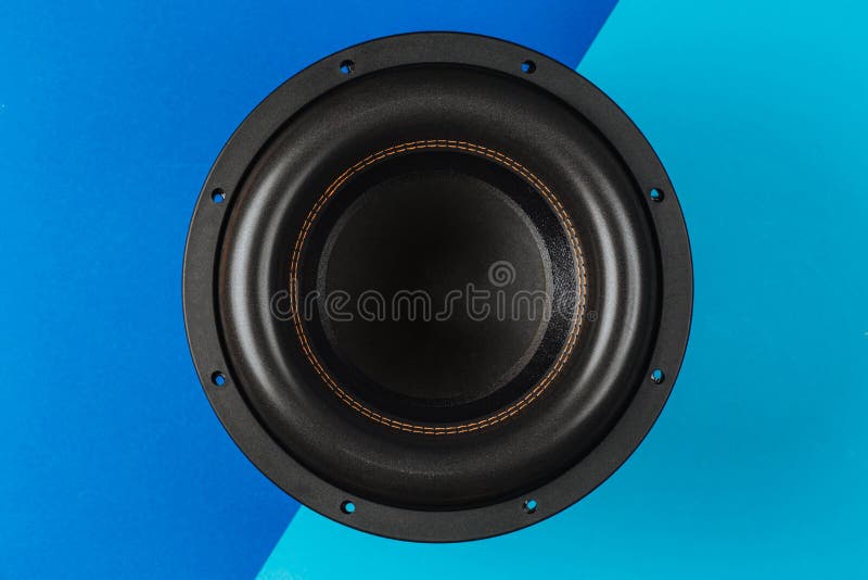 Car Audio, Big Black Subwoofer on a Bluelight Blue Background Stock