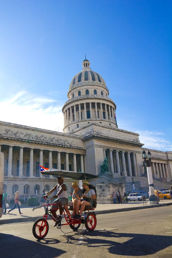 A car-bike with tourists. royalty free stock image A car-bike with tourists. royalty free stock image