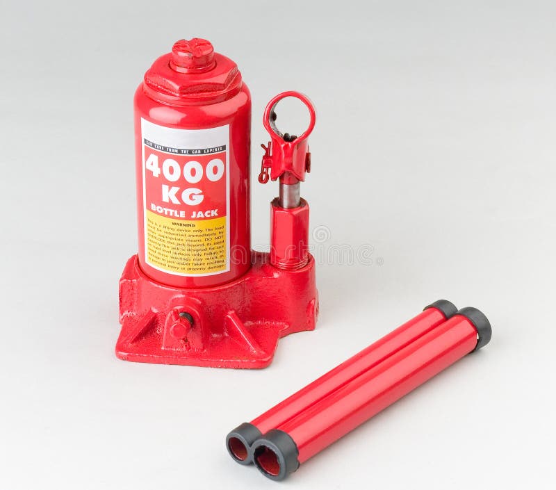 Car Jack Used for Changing a Spare Wheel Stock Photo Image of