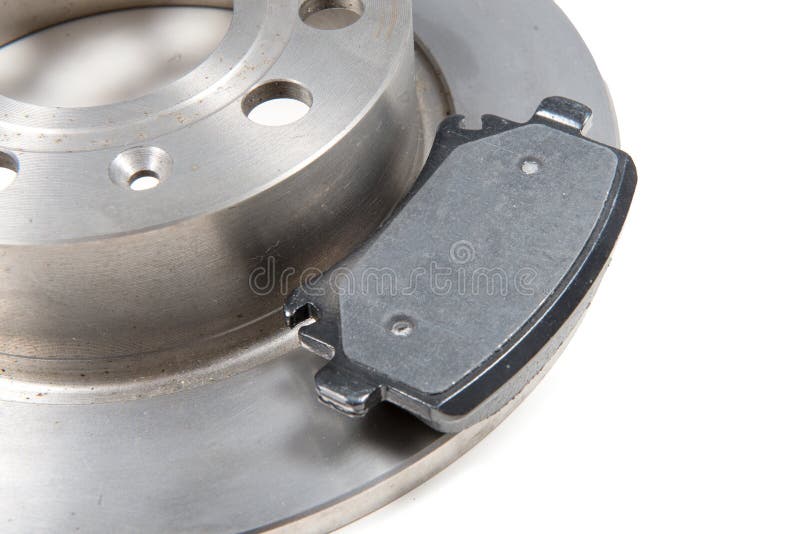 Car brake disc and pads on white background royalty free stock photos