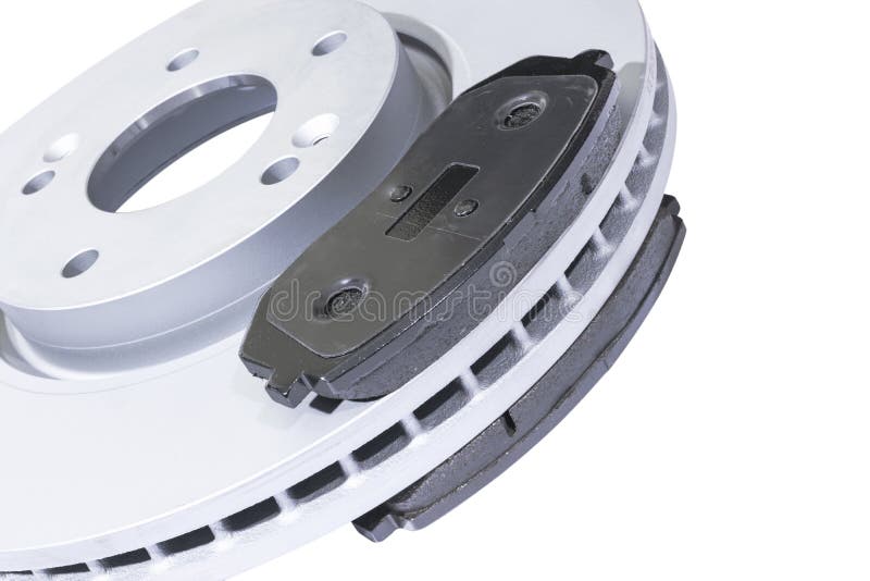Car Brake discs and brake pads isolated on white background. Auto parts. Brake disc rotor isolated on white. Braking disk. Car par stock photo Car Brake discs and brake pads isolated on white background. Auto parts. Brake disc rotor isolated on white. Braking disk. Car par stock photo