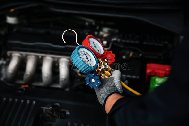 Premium Photo  Hand of technician installing front camera car recorder on  windscreen car