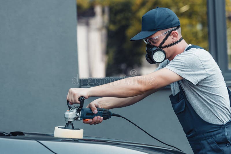 Car cleaner polishing car stock image. Image of overalls 204028997