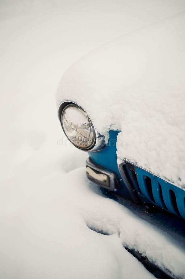 Cars Covered with Snow and Hoarfrost Standing on the Roadside. All