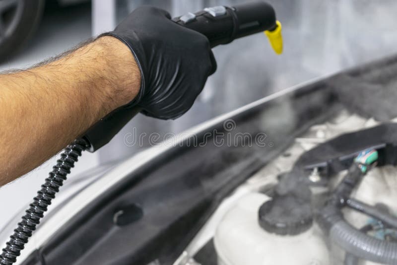 Detailing and Car Care Concept - Professional Using Steam Vacuum for  Draining Stains Stock Photo - Image of cleaner, auto: 93463138